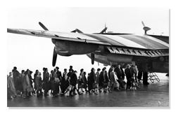 Refugees Boarding Plane in 1953
